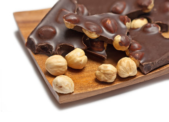 Chocolate with hazelnut, isolated on white