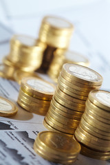 Business diagram on financial report with coins