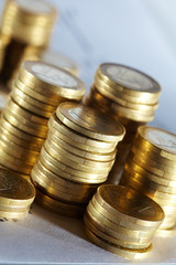 Business diagram on financial report with coins