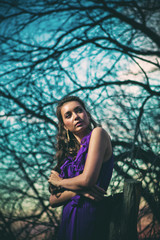 A beautiful young woman at sunset