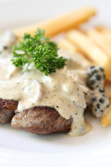 Beef steak with white sauce