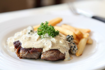 Beef steak with white sauce