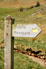 wooden footpath signpost