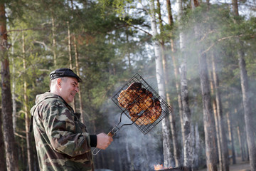 Portrait of man with grill