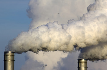 Smoke originating from a large industrial plant