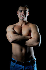 Fototapeta na wymiar Bodybuilder showing his muscles