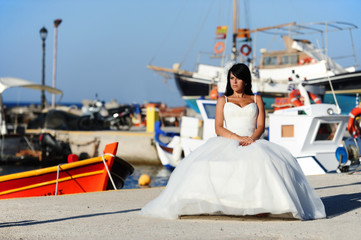Bride on a Santorini port in Greece
