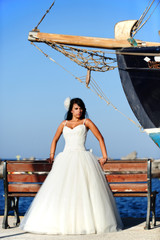 Bride on a Santorini port in Greece