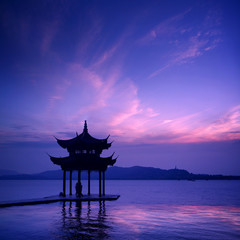 west lake with sunset in hangzhou,China. .
