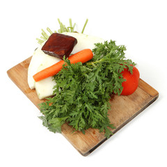 vegetables on hopping block with white background