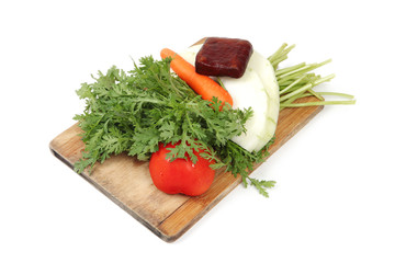 vegetables on hopping block with white background