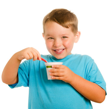 Happy Smiling Young Child Eating Yogurt