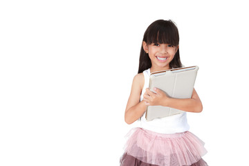 Smiling little girl with touch pad computer