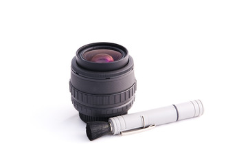 Photo Lens and cleaning tool isolated on white background