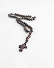 Old Wooden Rosary isolated on white background