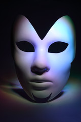 simple white serious mask, which is multicolored highlighted