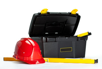 Construction toolbox, level and red hardhat