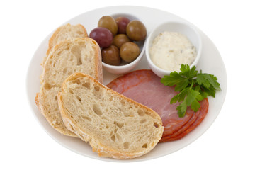 bread with ham, olives and sauce