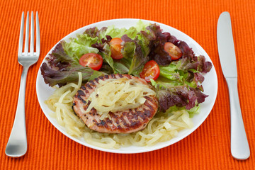turkey hamburger with onion and salad