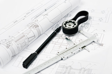 gear and caliper blueprint with pen