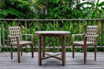 Wooden table and chair on terrace
