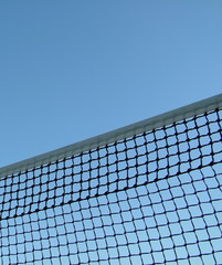 Tennis  net on the blue sky background