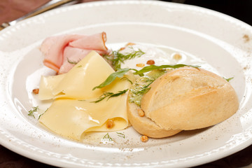 Poached egg with bacon and toast
