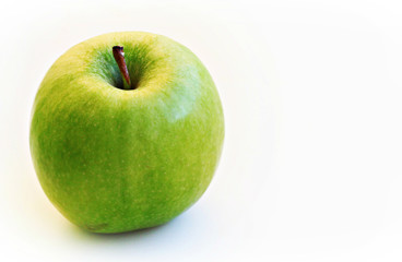 green apple on the white