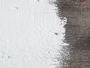 white paint on old wooden background