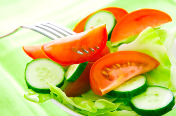 Fresh salad with tomatoes and cucumbers