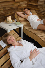 Spa room two women relax after treatment