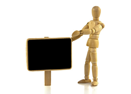 wooden puppet with blackboard