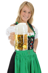 Junge Frau im Dirndl mit Maßkrug Bier