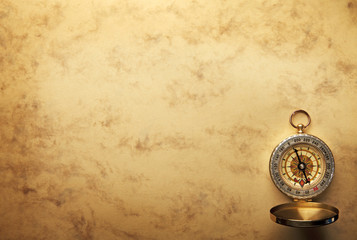 Compass on the old paper background