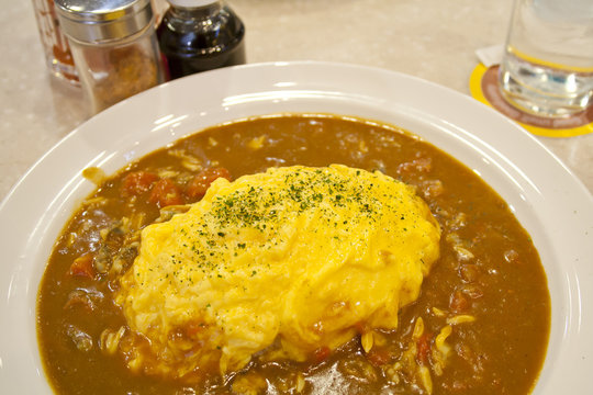 Japanese Rice With Curry And Omelet On Top