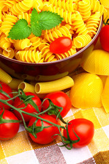 Delicious twig of tomatoes with several pasta types