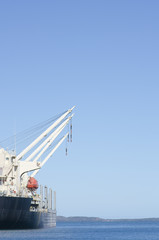 Cargo vessel anchoring at jetty