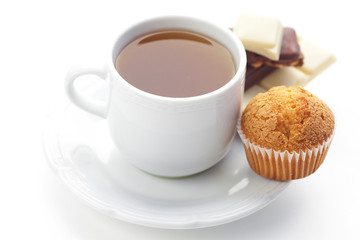 bar of chocolate,tea and muffin isolated on white