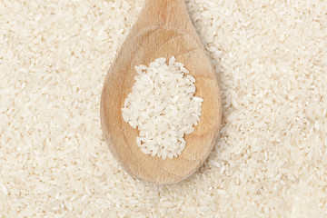 Healthy Dry Brown Rice in a spoon