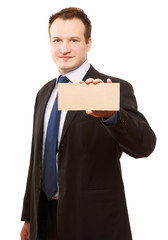 A businessman holding a blank