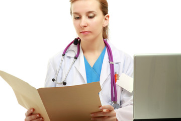 Doctor with stethoscope at her working place