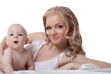 Mother with baby in bed