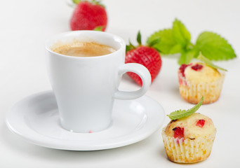 Coffee cup and muffins