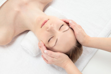 Obraz na płótnie Canvas エステ facial massage