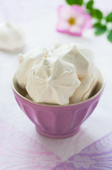Meringue cookies in the purple bowl