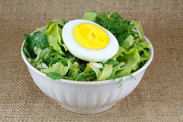 Salad in white bowl