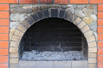 The small brick furnace and soot in it