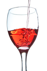 The wine pouring a drink into a glass. On a white background.