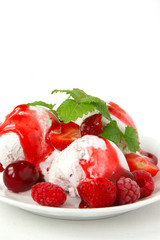 fruit ice cream with fresh berries and topping