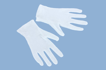 cloth gloves on blue background.